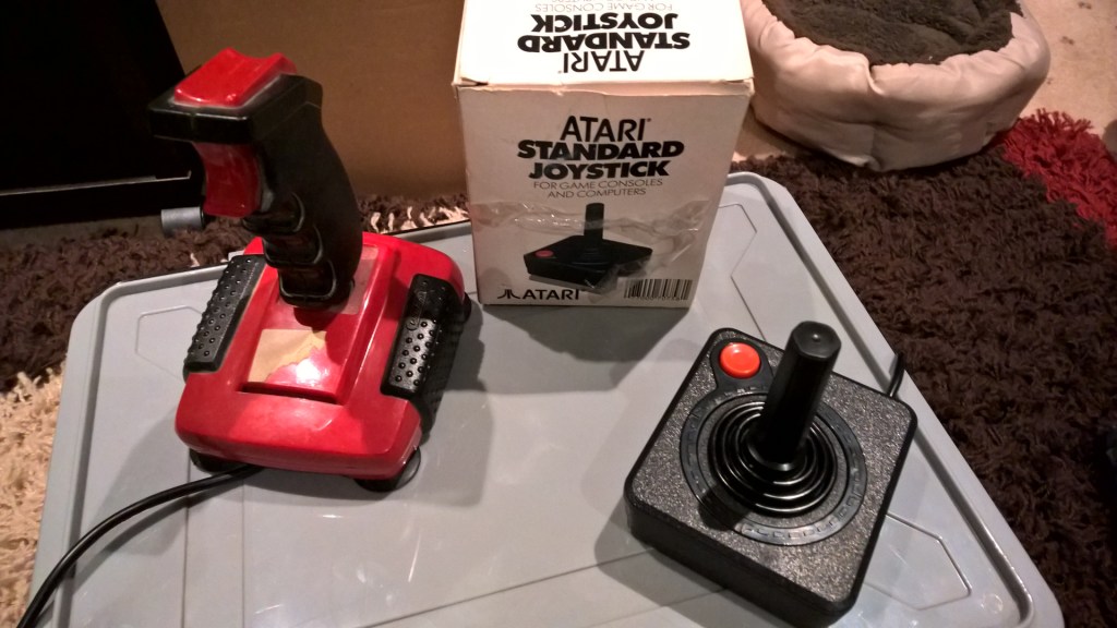 A couple of joysticks including the standard Atari model and the legendary Quickshot II Turbo.